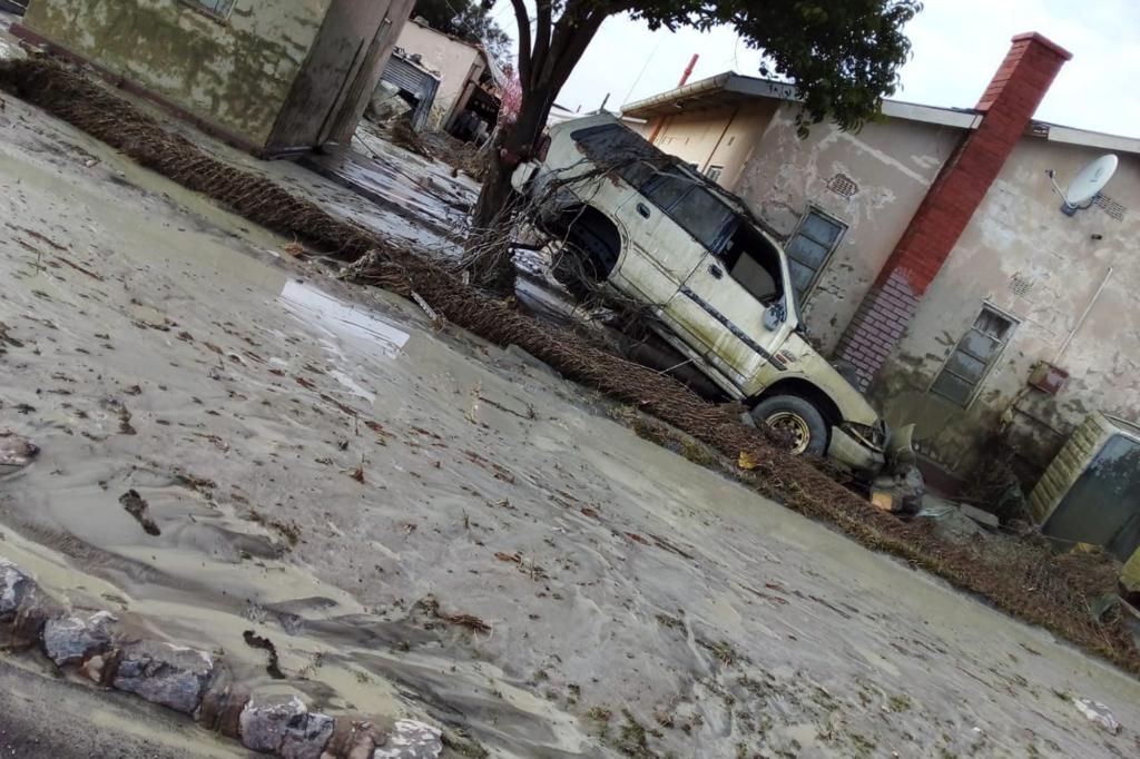 MINE DAM WALL COLLAPSES, KILLING ONE AND INJURING 40