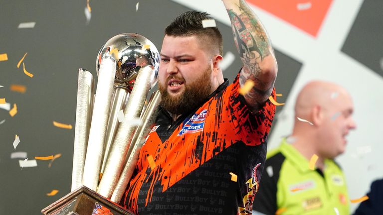 World Darts Championship: Michael Smith defeats Michael van Gerwen to claim glory at Alexandra Palace